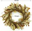 20-inch fall wreath with brown magnolia leaves & small pomegranate berries